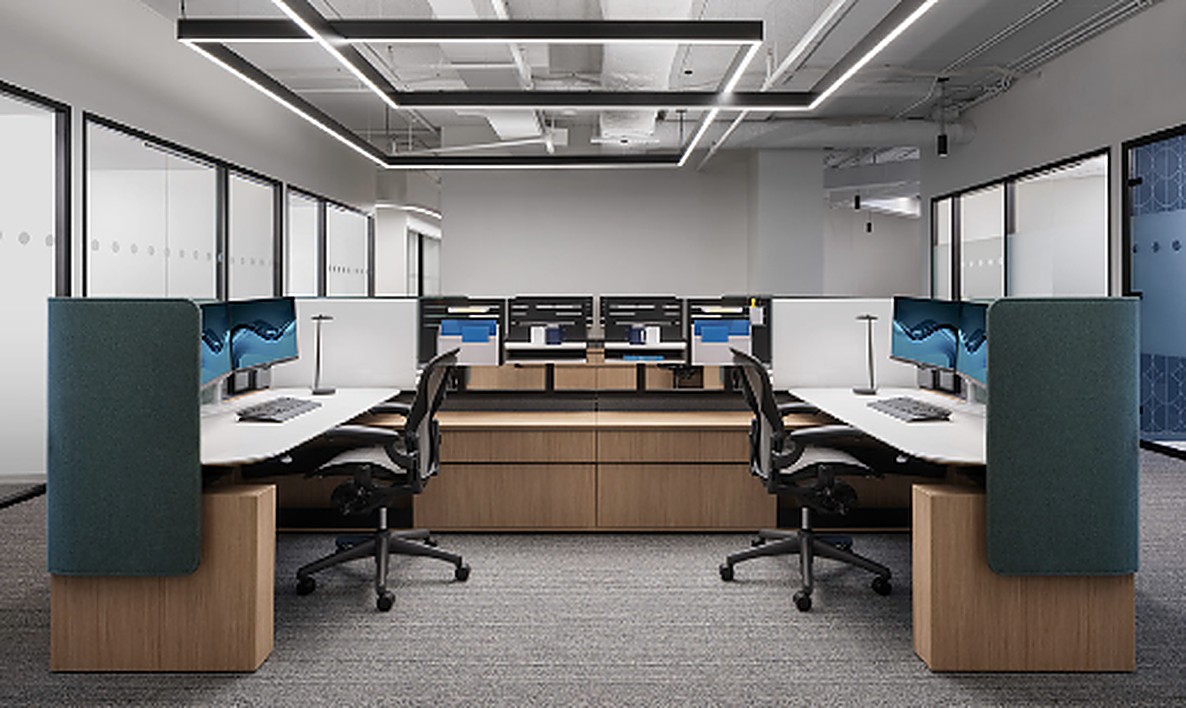 Completed benching workstation installation with privacy screens and dual-monitor setups