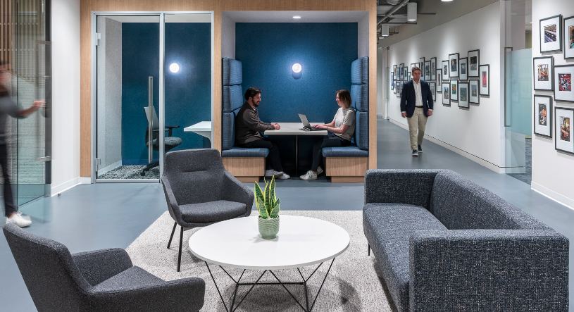 Furnished breakout lounge and workstations installed by Federal Interiors Group