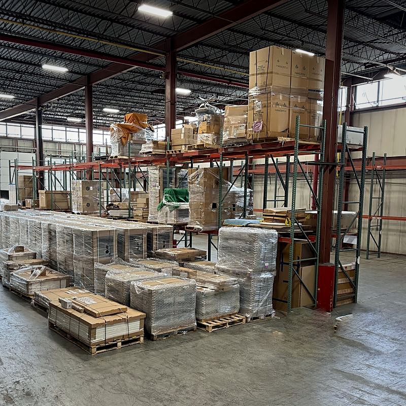 Interior of the FIG BWI logistics hub, showing palletized freight staged on the warehouse floor