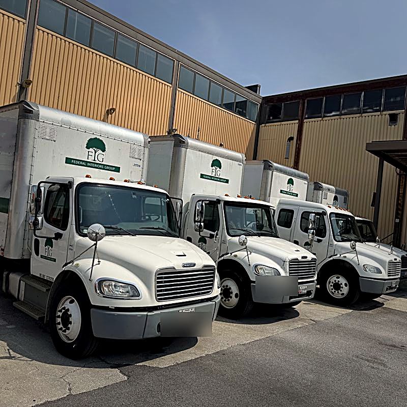 FIG branded delivery fleet lined up at the BWI hub loading dock